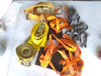 Grouping of ratchet strap tie downs