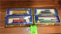 4 AHM cars in boxes