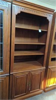 Ethan Allen dark wood bookcase with storage on
