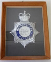 Framed Metropolitan Police hat badge