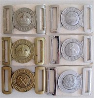 Six early Prison Services belt buckles