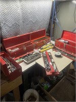 Four metal toolboxes comes with contents