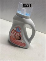 Full bottle of Dreft Baby laundry detergent