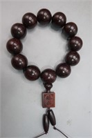 SOUTHERN ASIAN PURPLE TAN WOOD BEAD BRACELET