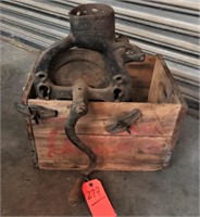 Antique Black Hawk corn sheller mounted to a