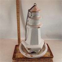 porcelin lighthouse birdfeeder