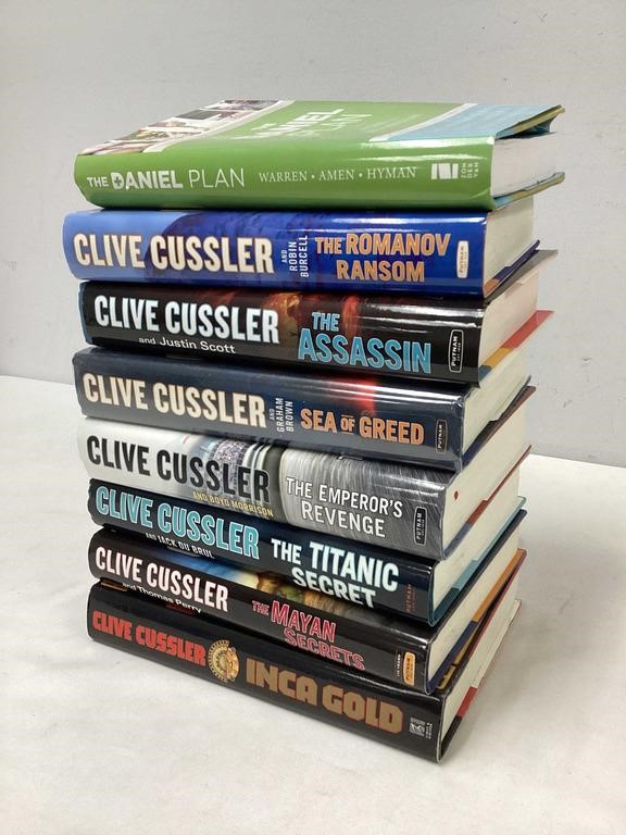 Eight Clive Cussler Books Lot A