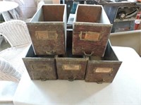 5 wood faced metal drawers