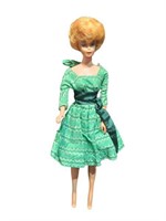 Vintage Barbie doll in green dress