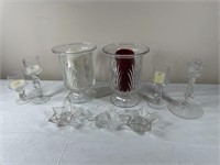 Glass candle holders with some candles