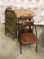 Table and folding chairs