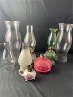 Variety of oil lamps and Hurricane style glass
