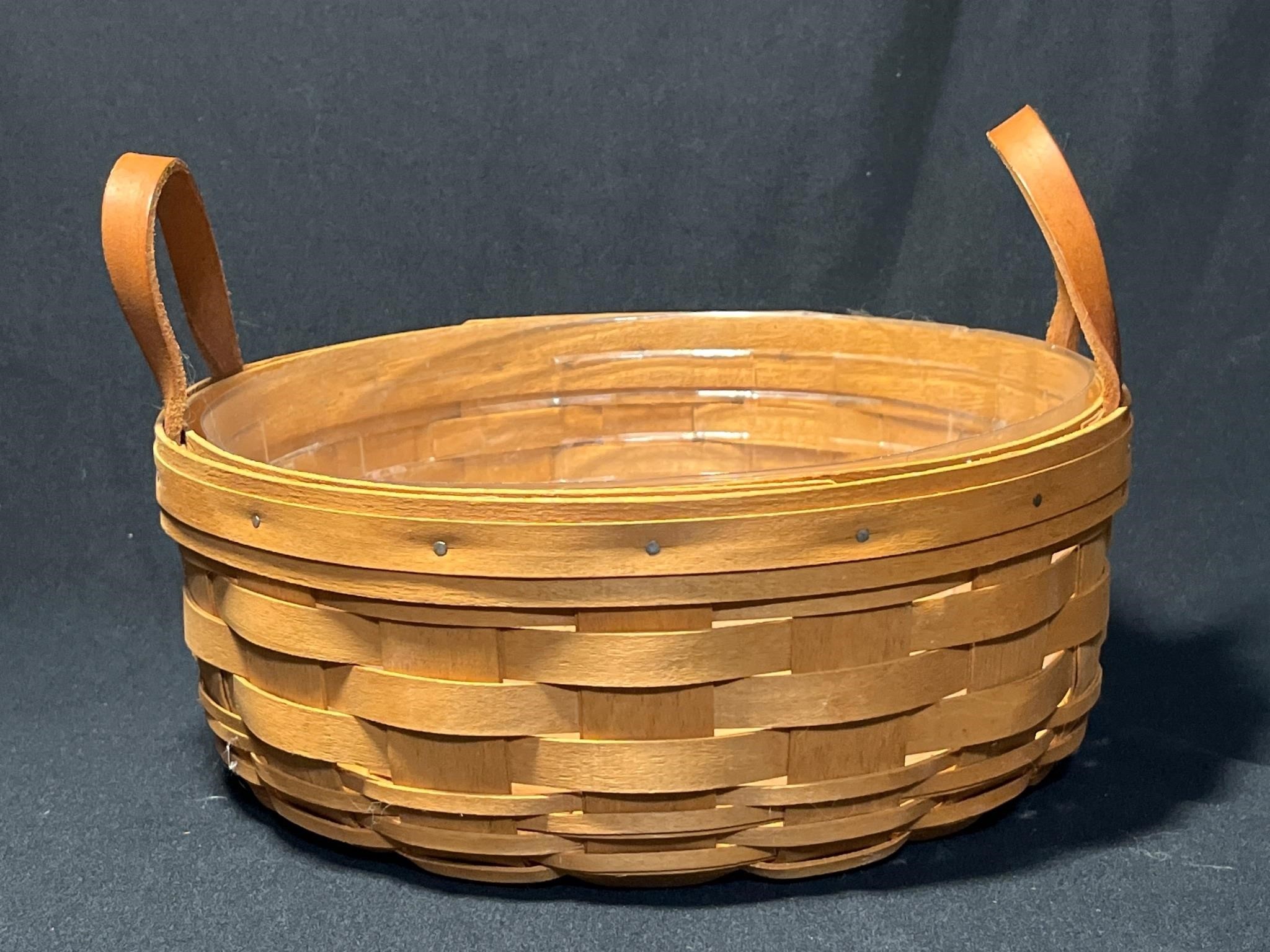 Longaberger basket. Handwoven. with protector.