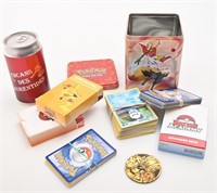 Lot de cartes Pokémon dans boîte de métal