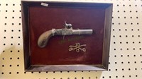 Framed wall hanger Blackpowder handgun, with a