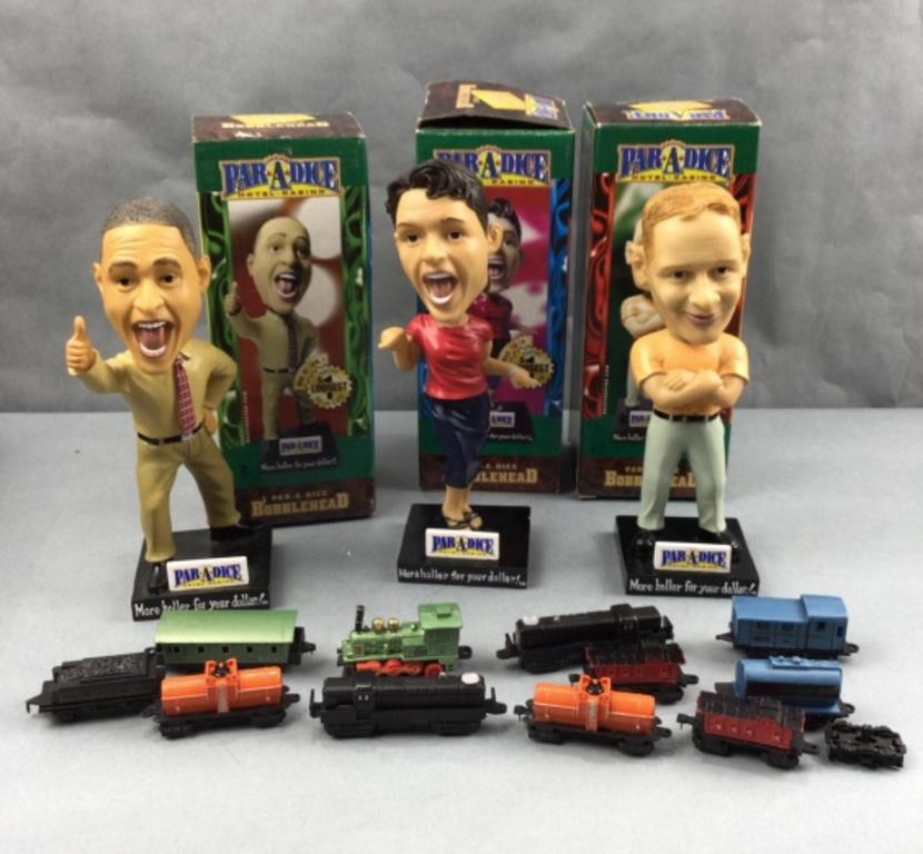 Paradise bobble heads with trains