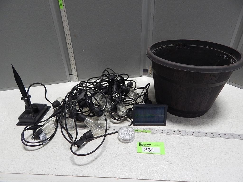 Plastic planter; solar powered string lights