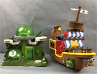 Green lantern and pirate ship plastic playsets