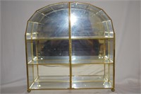 A Small Glass Curio Cabinet