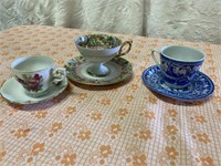 3 tea cups and saucers