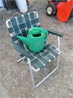 lawn chair, watering can
