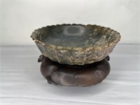 Hand-carved jadeite bowl on hand-carved rosewood