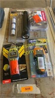 Moisture meter, wall scanner, flashlight, door