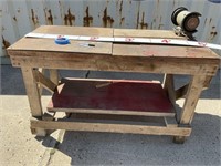 Wooden work bench with grinder