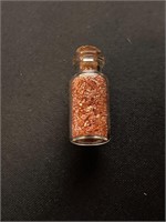 Glass Jar of copper Flakes