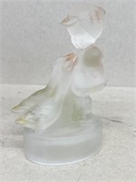 Glass girl figurine with ducks