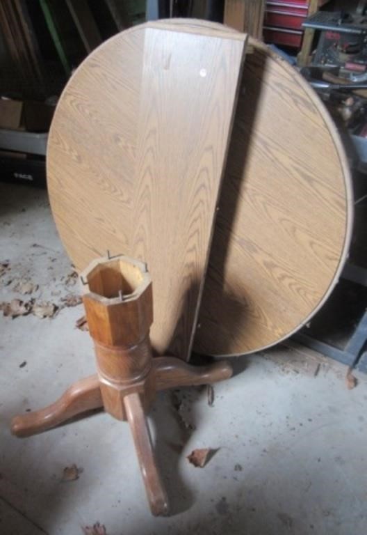 Round top table with leaf. Table measures 48"