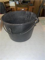 Three footed cast iron pot