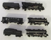 Lot of train engines and coal cars made by