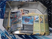 150+ Assorted Pokemon Cards in Tin