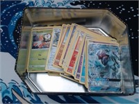 150+ Assorted Pokemon Cards in Tin
