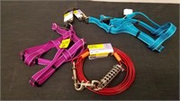 Two new up to 50 lb dog harnesses and 120-ft tie