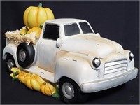 White composite truck with pumpkins