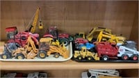Two tray lot of die cast toys - Case tractors,