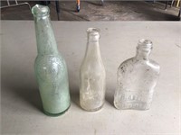 3 BOTTLES WITH WRITING