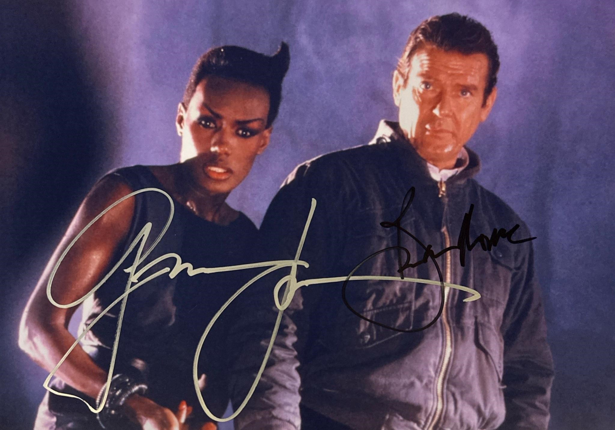 Autograph COA 007 Roger Moore Photo