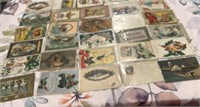 various vintage embossed used holiday postcards,