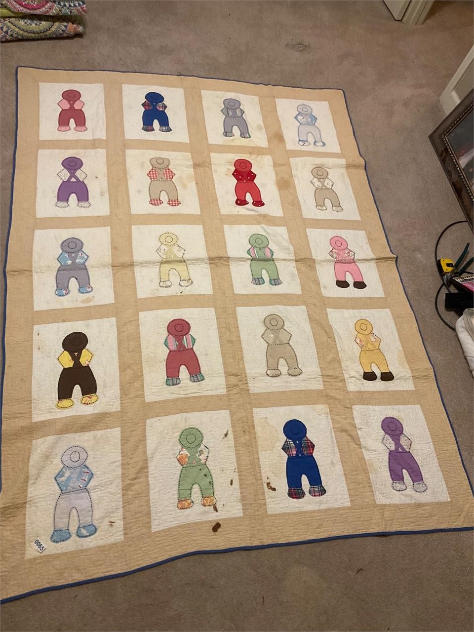 Tan outlined Dutch boy baby quilt- hand sewn