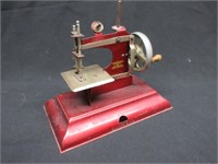 A Casige Child's Manual Sewing Machine