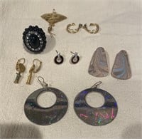 Assorted earrings and large statement ring