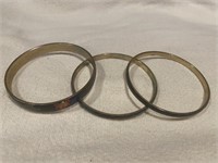 Lot of three vintage metal bangle bracelets