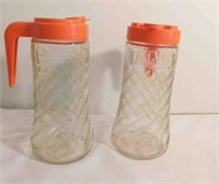 2 Vintage Tang Glass Pitchers