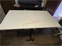 59in wide 35in tall drop leaf craft table