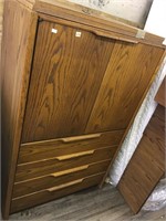 Oak wood cabinet with a lot of storage and drawers