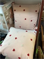 2 pink throw pillows