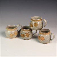 Signed studio pottery mugs maple leaf design